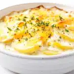 creamy scalloped potatoes with cheddar - featured image