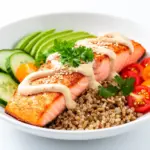 Mediterranean salmon grain bowl with tahini - featured image